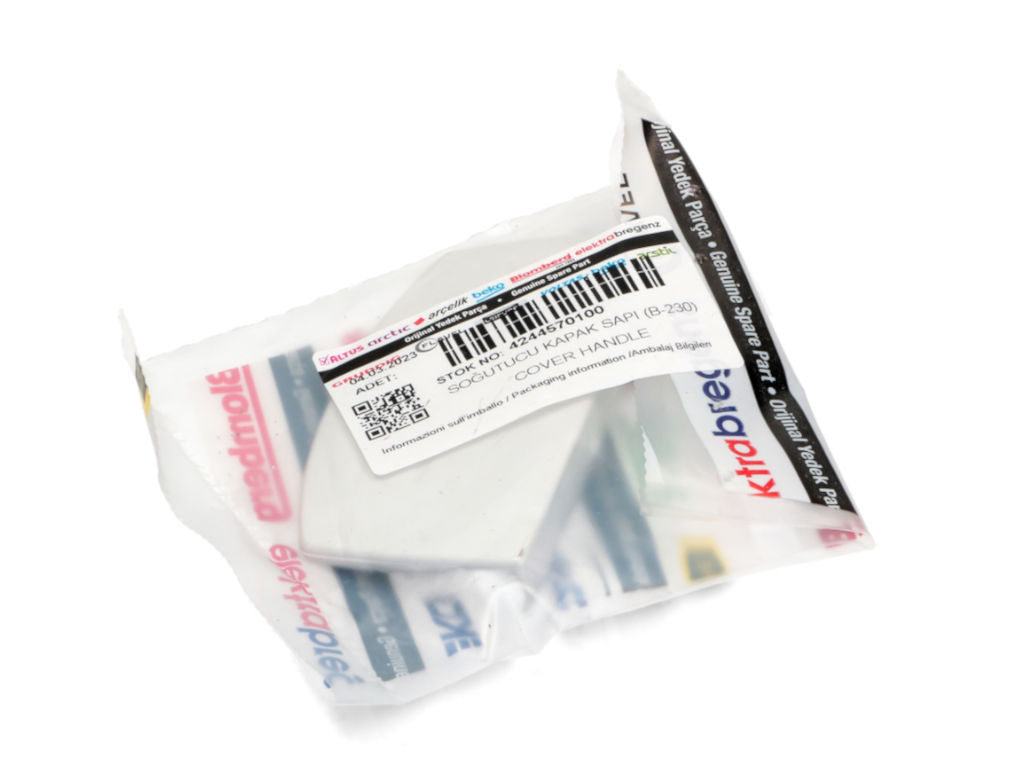 Madlo dvířek mražáku pro lednici Beko 4244570100, originál